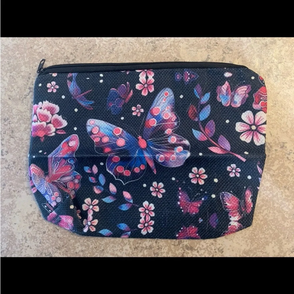 New! Polyester Lightweight Butterfly Design Cosmetic Pouch with Zipper Closure.